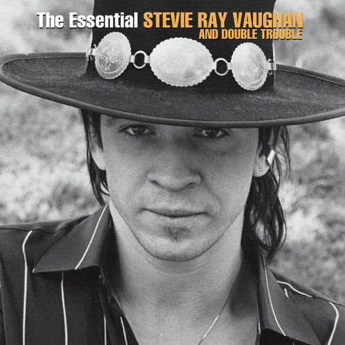 the album cover for Stevie Vaughan Ray &amp; Double Trouble - The Essential Stevie Ray Vaughan And Double Trouble