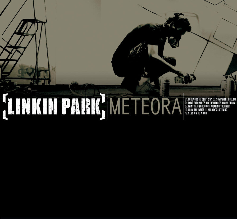 the album cover for Linkin Park - Meteora [TRANSLUCENT GOLD &amp; RED SPLATTER LP VINYL]