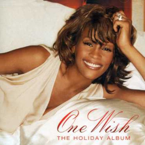 the album cover for Whitney Houston - One Wish (The Holiday Album)